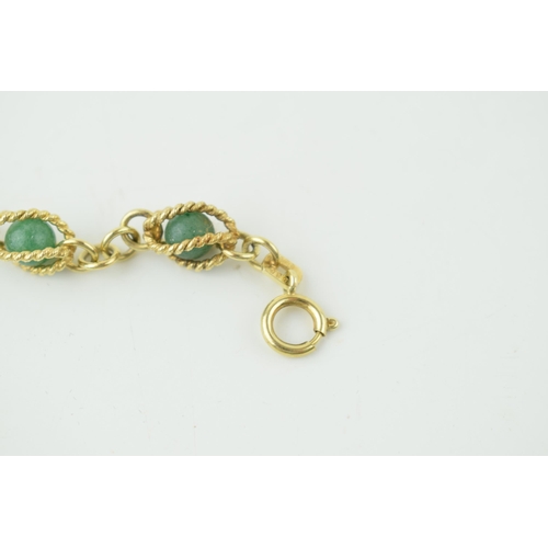 546 - 14ct gold bracelet, with enclosed jade (or similar) balls, rope effect bracelet, gross 14.4g, 18.5cm... 