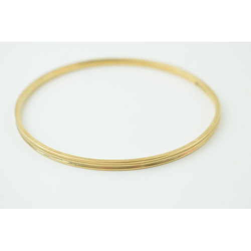 549 - A 9ct yellow gold bangle marked .375. Weight 18.7 grams