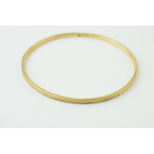 549 - A 9ct yellow gold bangle marked .375. Weight 18.7 grams