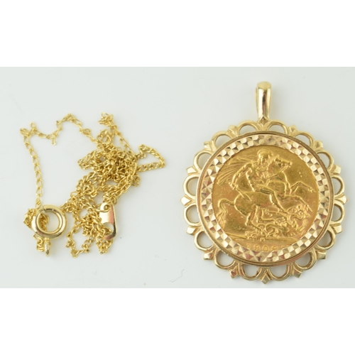 Full Sovereign coin 1908, in a 9ct yellow gold mount (Weight 11.6 grams) together with a yellow coloured metal chain.