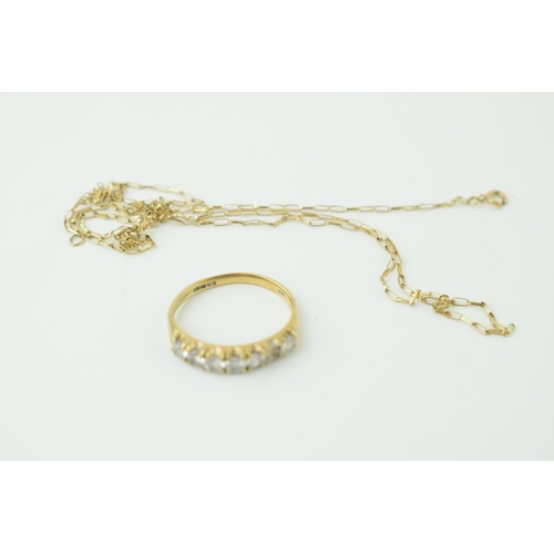 554 - 9ct yellow gold ring set with CZ (gross weight 2.2 grams) a/f and a yellow coloured metal chain a/f.