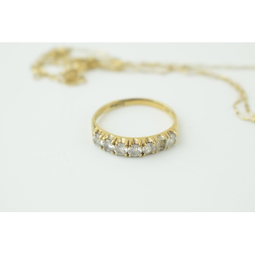 554 - 9ct yellow gold ring set with CZ (gross weight 2.2 grams) a/f and a yellow coloured metal chain a/f.