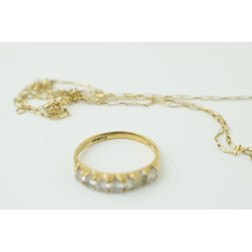 554 - 9ct yellow gold ring set with CZ (gross weight 2.2 grams) a/f and a yellow coloured metal chain a/f.