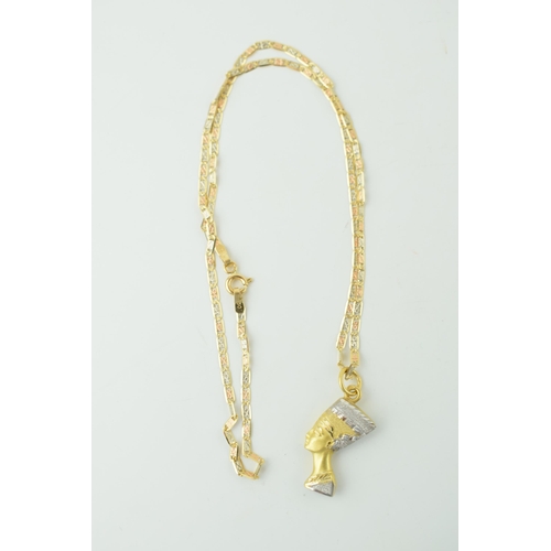 556 - 18ct yellow gold necklace with pendant in the form of Queen Nefertiti Weight 4.5 grams.