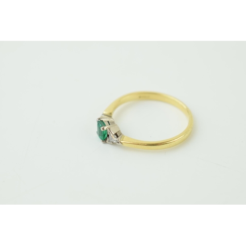 557 - 18ct yellow gold Art Deco style ring set with central baguette cut emerald and two diamonds. Ring si... 