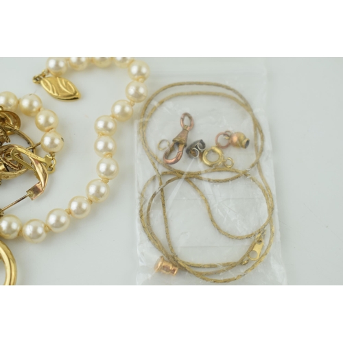 568A - A collection of yellow metal and costume jewellery t include pearls, earrings and others, some tests... 