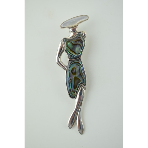 576 - A contemporary sterling silver Art Deco style brooch set with Abalone shell. Height 6.5cm.