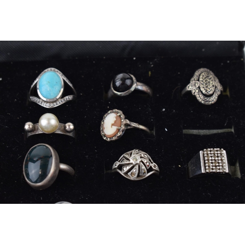 577 - A collection of silver to include 17 silver rings, of varying styles and sizes, with other silver je... 