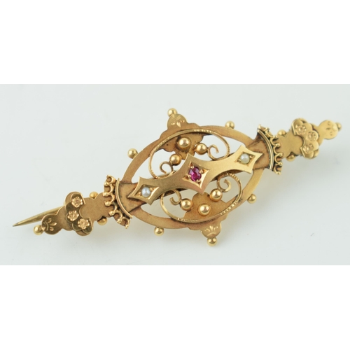 584 - 9ct gold bar brooch, set ruby and pearl stones, 2.7g, 49mm wide, yellow metal pin.