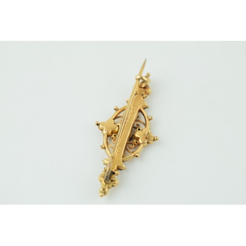 584 - 9ct gold bar brooch, set ruby and pearl stones, 2.7g, 49mm wide, yellow metal pin.