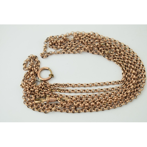 588 - A rose rolled gold longuard chain with working clasp, 147cm long.