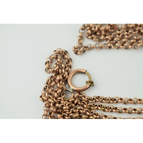 588 - A rose rolled gold longuard chain with working clasp, 147cm long.