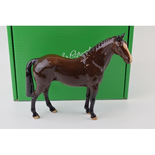 12 - Boxed Beswick 'Brown Hunter Horse' issued in 2005 in a limited edition of 500. Height 21cm.