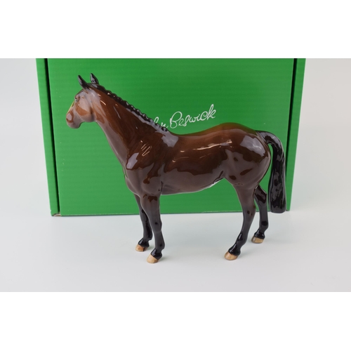 12 - Boxed Beswick 'Brown Hunter Horse' issued in 2005 in a limited edition of 500. Height 21cm.