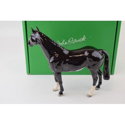 13 - Boxed Beswick 'Black Hunter Horse' issued in 2005 in a limited edition of 500. Height 21cm.