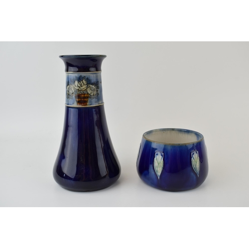 134 - Royal Doulton stoneware pottery to include a bud vase with floral decoration, 18.5cm tall, with an o... 