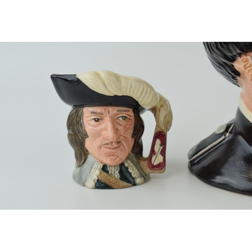 136 - A Royal Doulton miniature character jug D'artagnan D6765, with a large Guardsman in overpainted blac... 