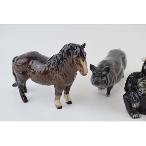 18 - A collection of Beswick and Royal Doulton figures to include Pigs, Sheltand Pony together with a Joh... 