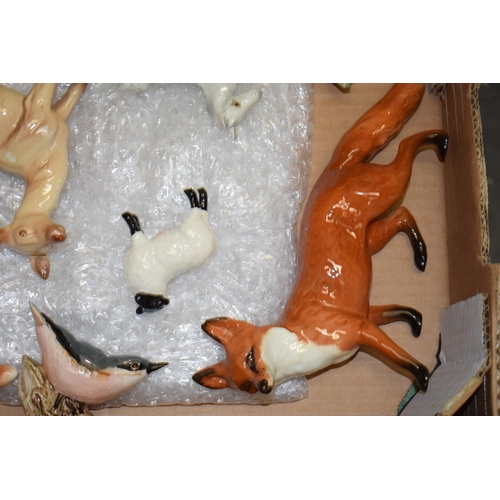 2 - A collection of Beswick animals a/f to include Fox, Deer, Sheep, Horse and Bird. (7)