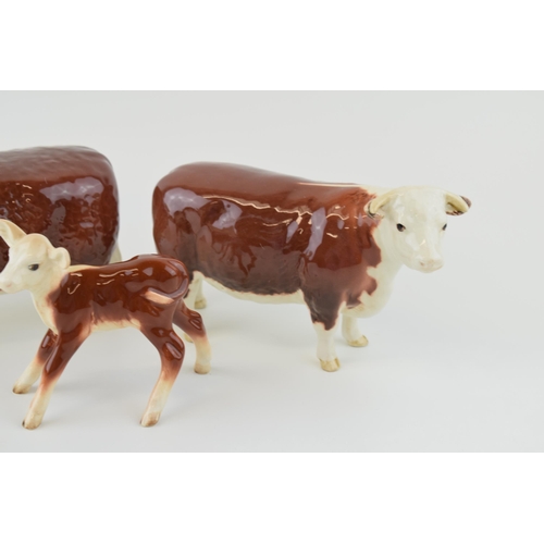 21 - Beswick cattle family to include the Hereford Bull, Hereford Cow and  Hereford Calf (3).