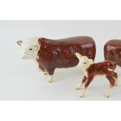 21 - Beswick cattle family to include the Hereford Bull, Hereford Cow and  Hereford Calf (3).