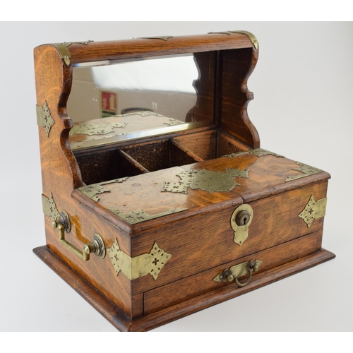 328 - Late 19th / Early 20th century golden oak tantalus / cigar box. Silver-plated fittings, handles to b... 