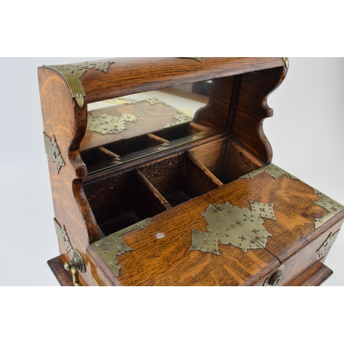 328 - Late 19th / Early 20th century golden oak tantalus / cigar box. Silver-plated fittings, handles to b... 