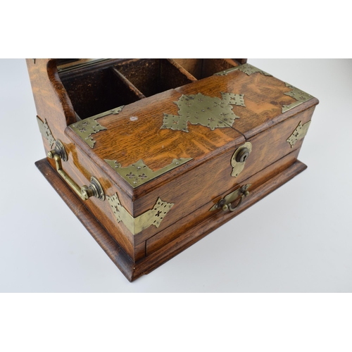 328 - Late 19th / Early 20th century golden oak tantalus / cigar box. Silver-plated fittings, handles to b... 