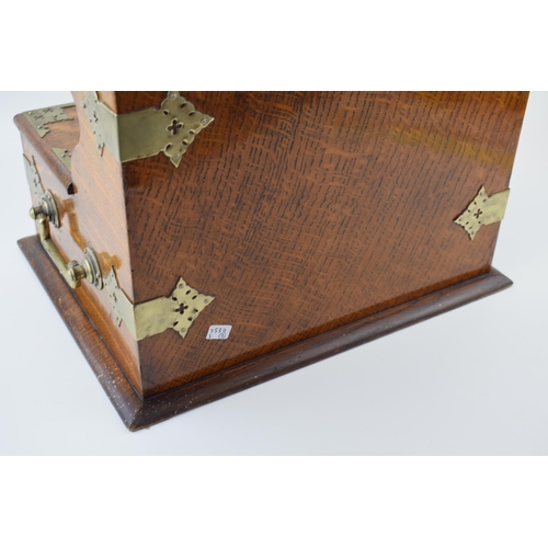 328 - Late 19th / Early 20th century golden oak tantalus / cigar box. Silver-plated fittings, handles to b... 