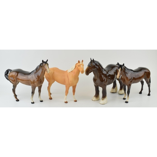 35 - Beswick horses to include a brown shire horse, a matte palomino swishtail, a brown swishtail and a b... 