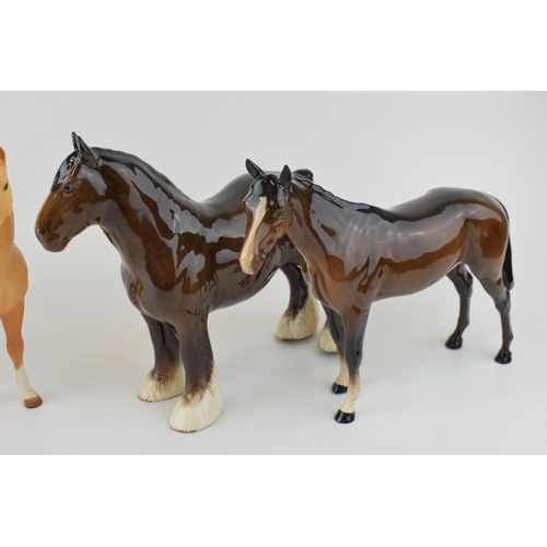 35 - Beswick horses to include a brown shire horse, a matte palomino swishtail, a brown swishtail and a b... 