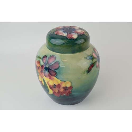 40 - Moorcroft spring flowers ginger jar, graduated green to blue ground, impressed marks and underglaze ... 