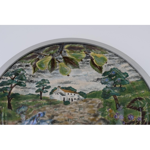 44 - Cobridge Stoneware limited edition charger, 1 of 5, with a cottage amongst rural settings, featuring... 