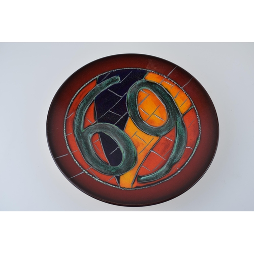 46 - Poole Pottery shallow bowl, signed by Anita Harris, 1/1, abstract design with the number '69', 26.5c... 