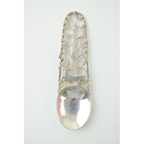 519 - Silver National Trust of Scotland caddy spoon, Edinburgh 1987, with stylized deer decoration, 13.6g,... 