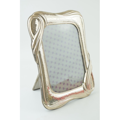 530 - Silver Art Nouveau photo frame, easel back, hammered effect, continental, 25cm tall.