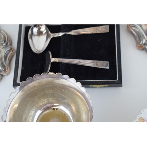 537 - Silver plated items to include a table centre piece / epergne with associated plates, a pair of cand... 