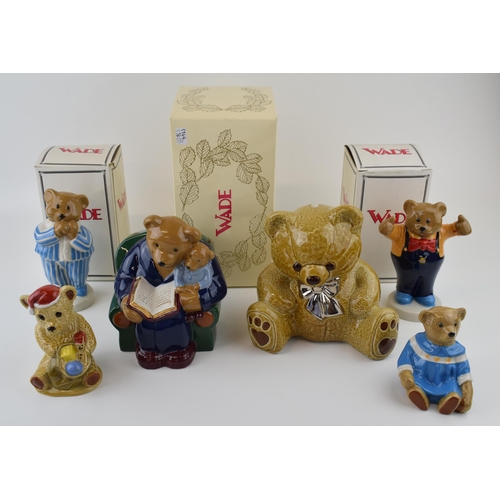 54 - A collection of Wade Teddy Bear figures to include boxed Money Box, and limited edited Baby Bear col... 