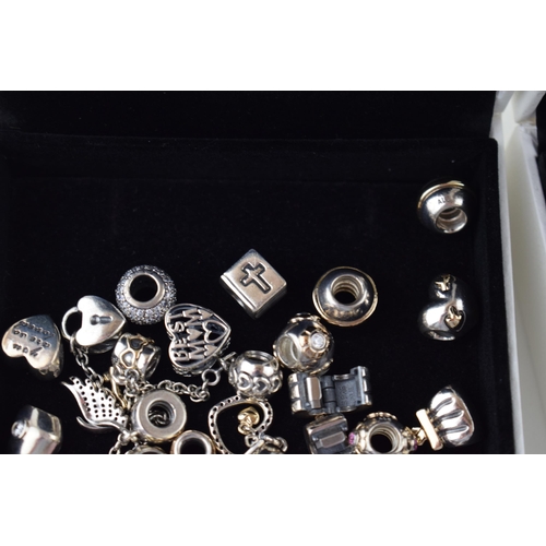 544 - Pandora: a collection of Pandora to include two bracelets and over 20 charms of varying styles and d... 