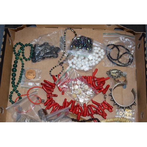 591 - A collection of costume jewellery to include necklaces, a malachite necklace, bracelets, bangles, an... 