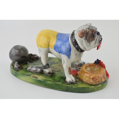 62 - Bairstow Manor Collectables political model of a Ukranian bulldog tearing a Russian flag apart, 20cm... 