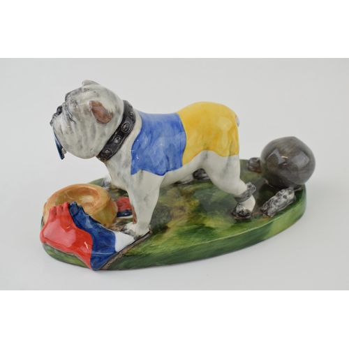 62 - Bairstow Manor Collectables political model of a Ukranian bulldog tearing a Russian flag apart, 20cm... 