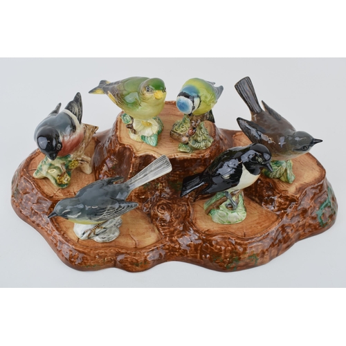 8 - A collection of Beswick Birds to include Blue Tit, 992, Bullfinch 1042, Greenfinch 2105, Whitethroat... 