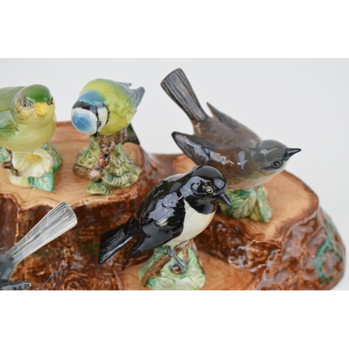 8 - A collection of Beswick Birds to include Blue Tit, 992, Bullfinch 1042, Greenfinch 2105, Whitethroat... 