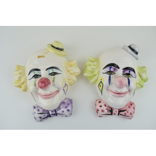 83 - A pair of ceramic 'Clown Face' wall plaques, Made in Spain. Height 24cm.