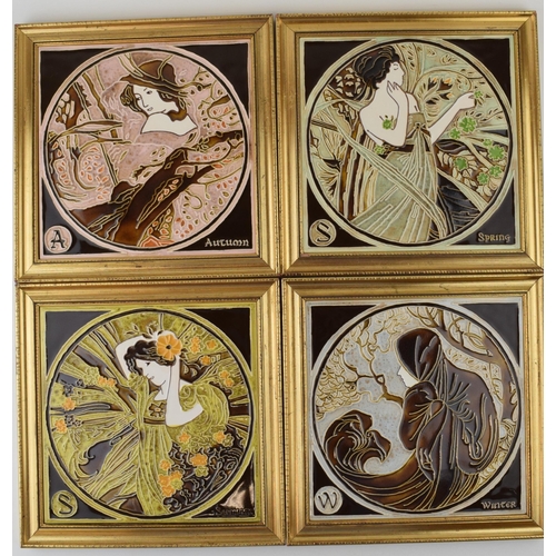 85A - Maws & Co Tunstall set of four framed tiled of the four seasons, gilt frames, 25cm x 25cm (4).