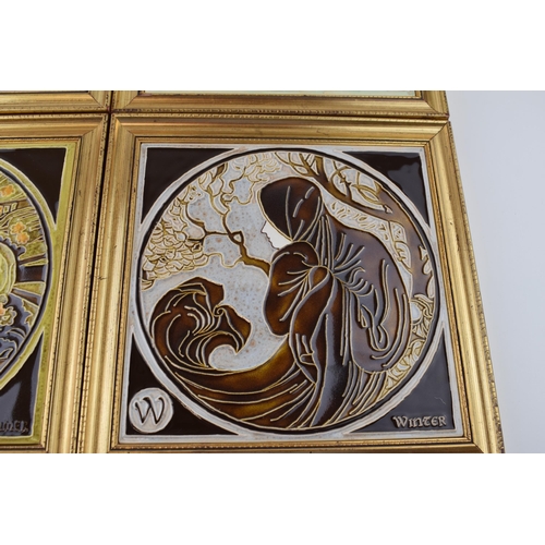 85A - Maws & Co Tunstall set of four framed tiled of the four seasons, gilt frames, 25cm x 25cm (4).