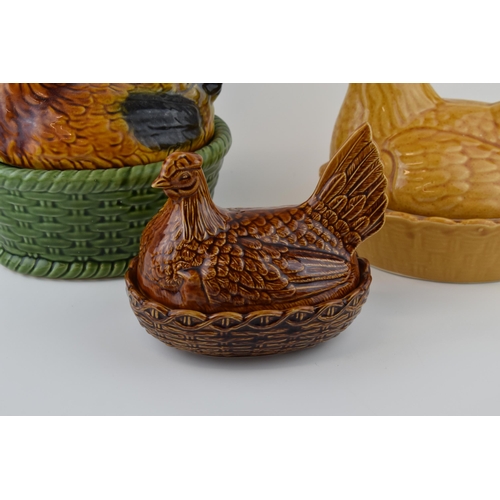 89 - Three ceramic Hen Crocks to include a Portmeirion example. (3)