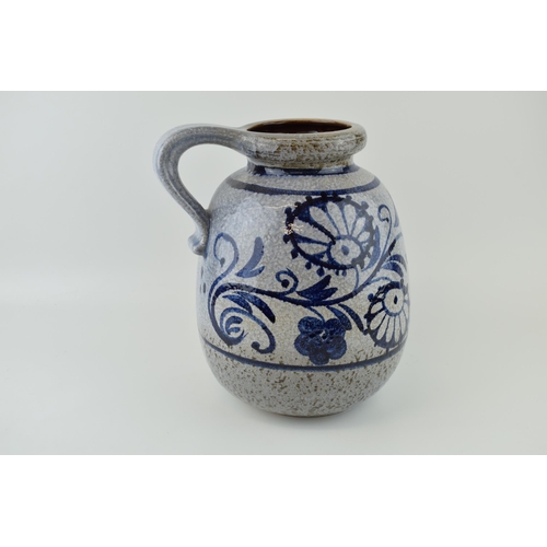 90A - A large West German pottery jug with Safi / Iznik style decoration, grey mottled glaze, 30cm tall.