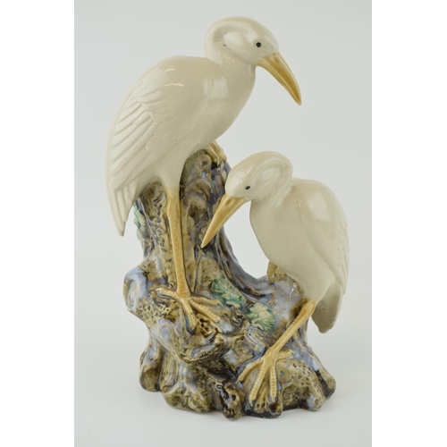 94 - Continental Majolica spill vase with white Egrets. Late 20th century. Height 26.5cm.